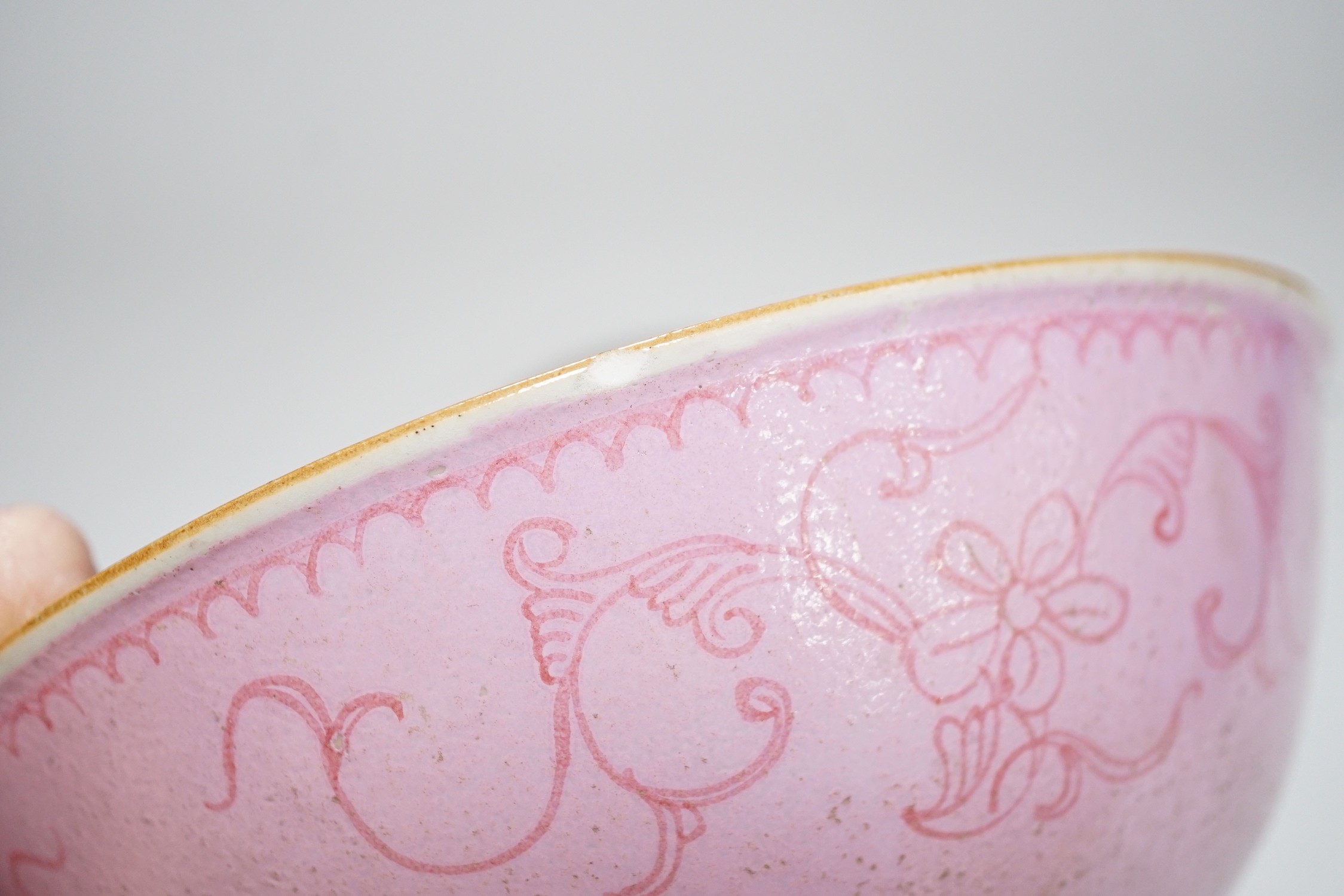 An early 19th century? Chinese powder pink ground export porcelain bowl, 17cm (a.f.), on associated pierced carved hardwood stand